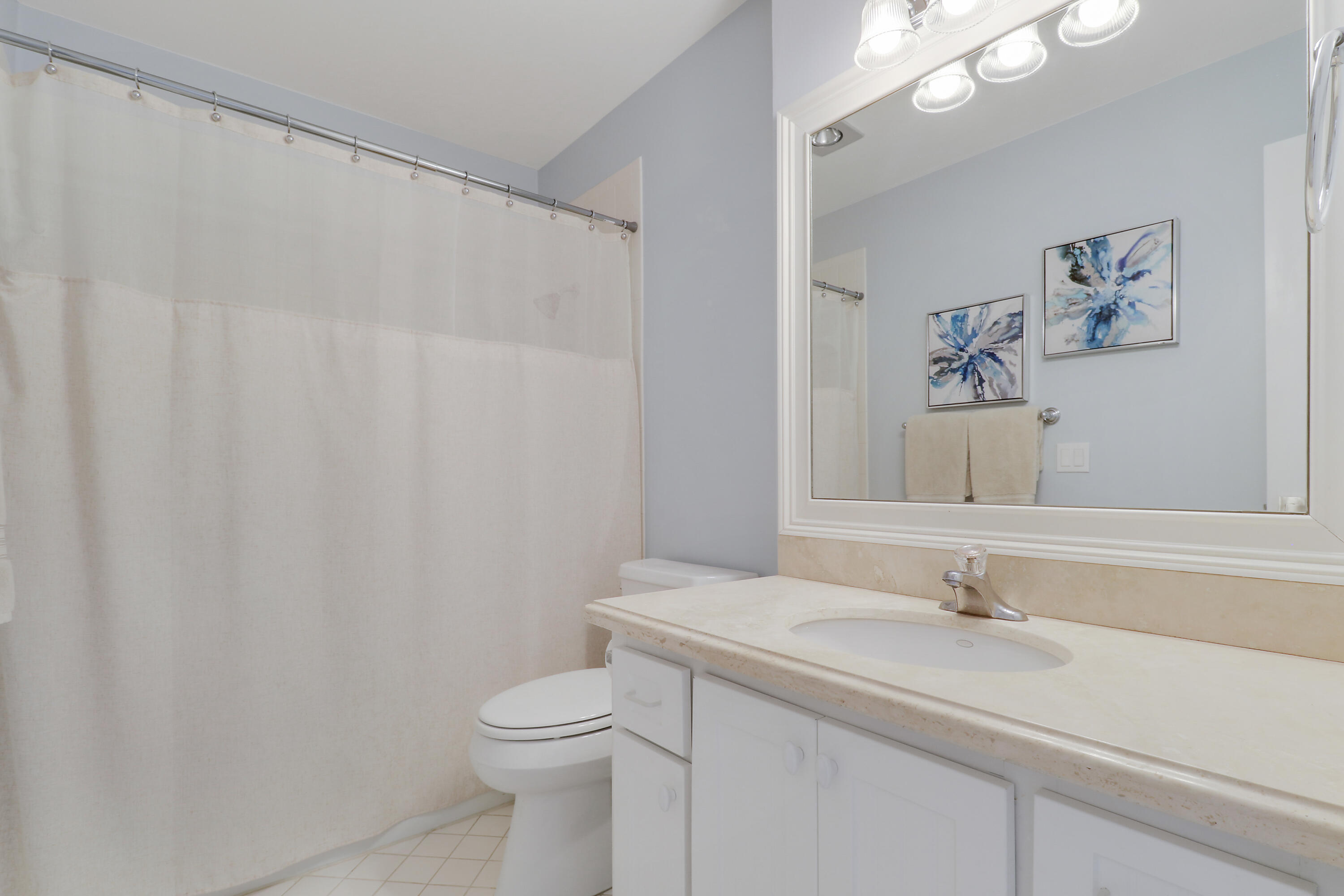 275 South Beach Road, Unit B202 Tequesta, FL 33469 - Photo 37 of 37 a bathroom with a sink and a toilet