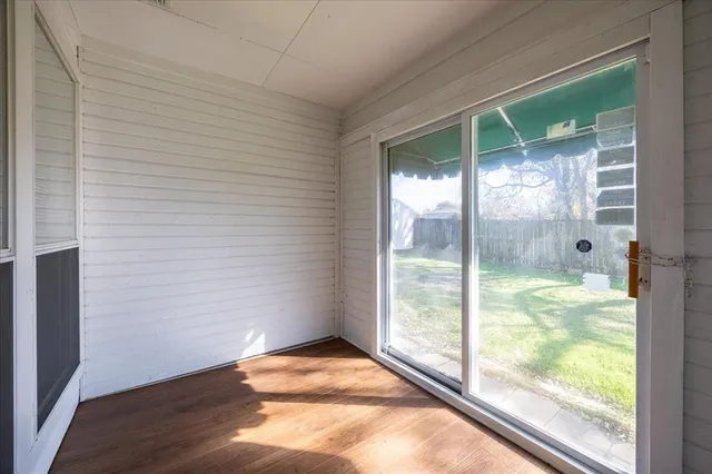 a bedroom with a bed and a cabinets
