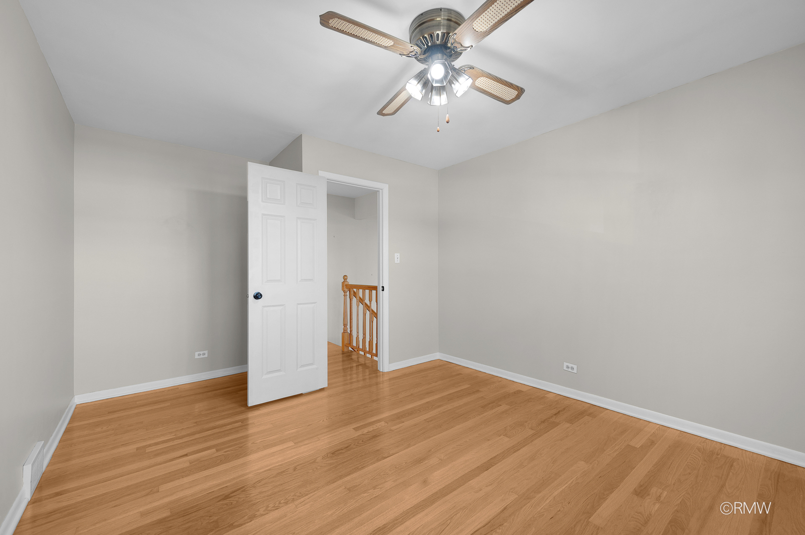 18 South Vista Avenue Addison, IL 60101 - Photo 19 of 32 a view of empty room with wooden floor