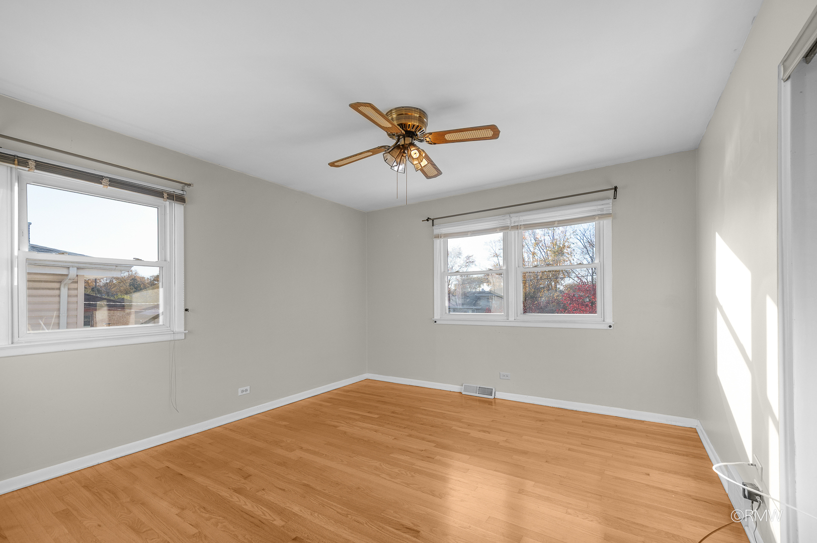 18 South Vista Avenue Addison, IL 60101 - Photo 21 of 32 a view of a room with a window and a chandelier fan