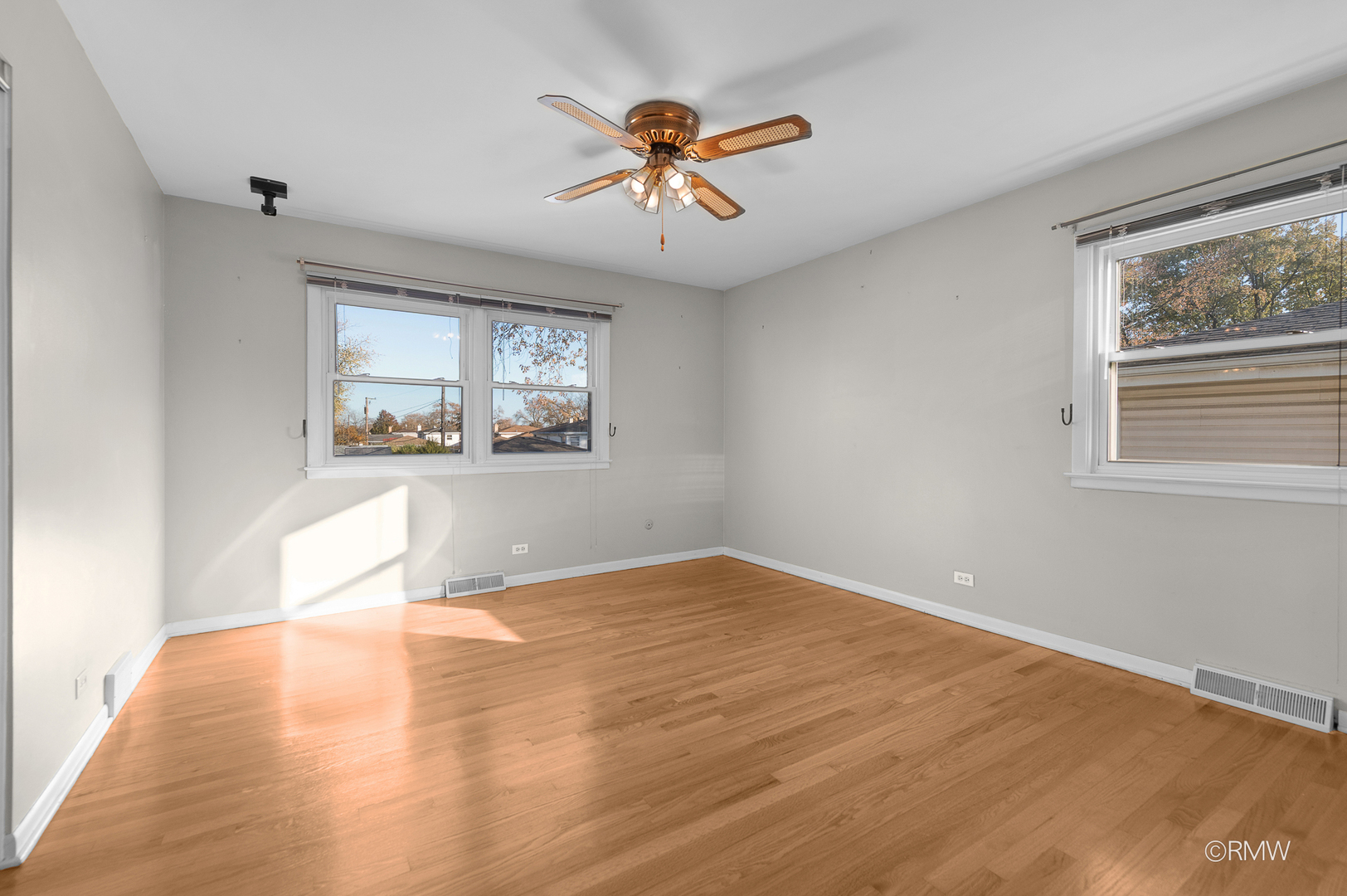18 South Vista Avenue Addison, IL 60101 - Photo 23 of 32 a view of a livingroom with a window and wooden floor