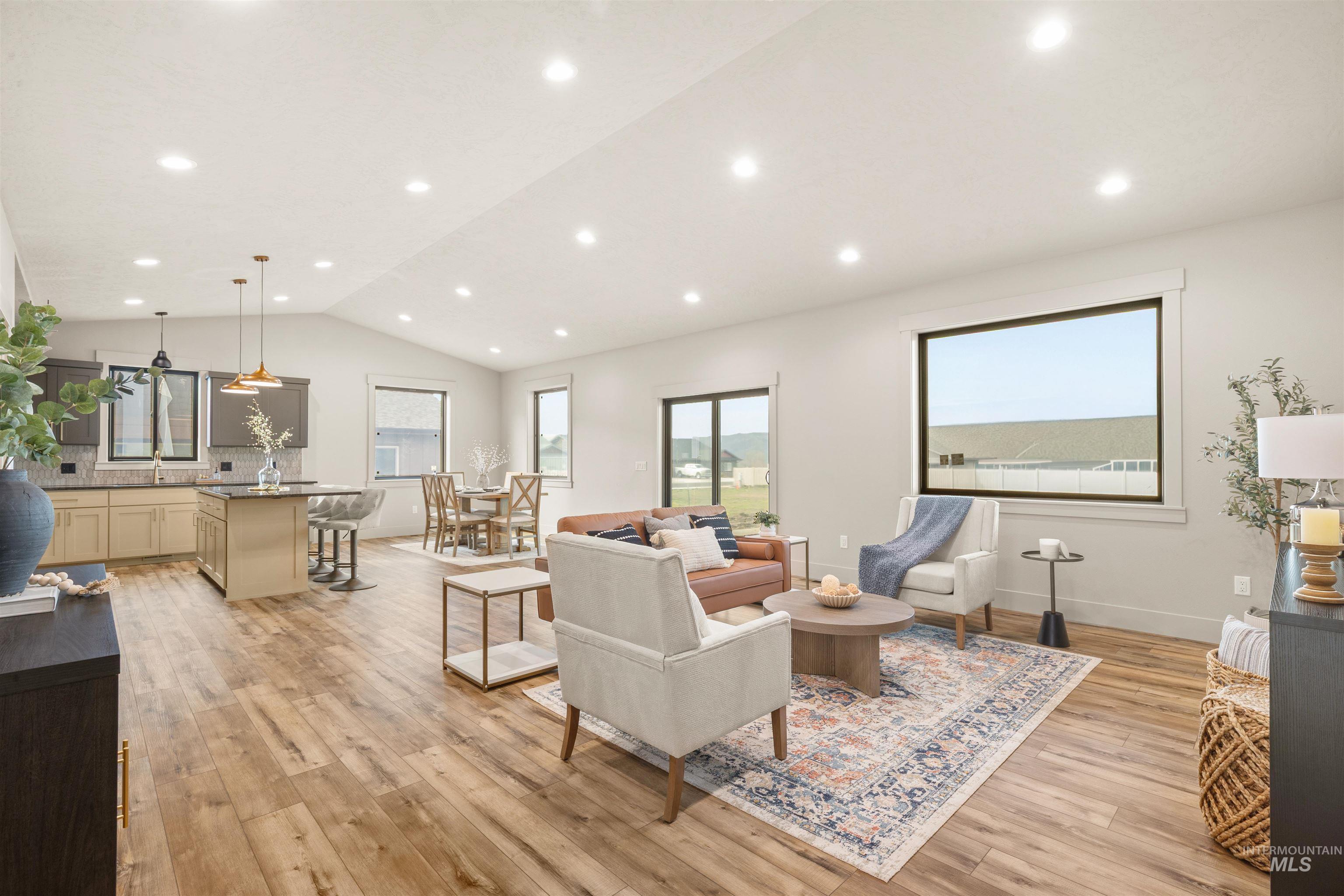 335 Warner Avenue Lewiston, ID 83501 - Photo 1 of 43 Living room featuring light wood finished floors, lofted ceiling, and recessed lighting