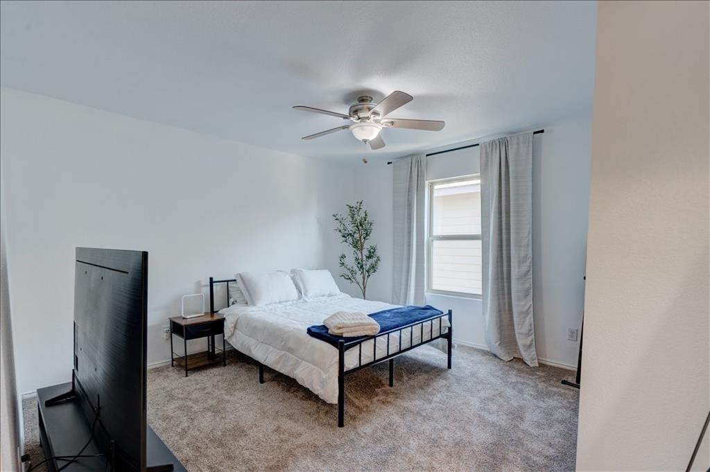 6233 Skysail Road Fort Worth, TX 76179 - Photo 23 of 30 a living room with furniture and a window