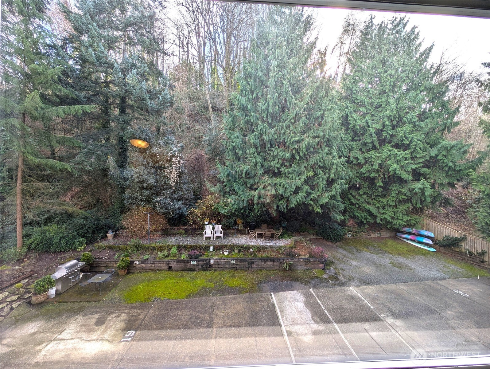 1156 Alki Avenue Southwest, Unit 201 Seattle, WA 98116 - Photo 19 of 40 a view of a swimming pool with a yard