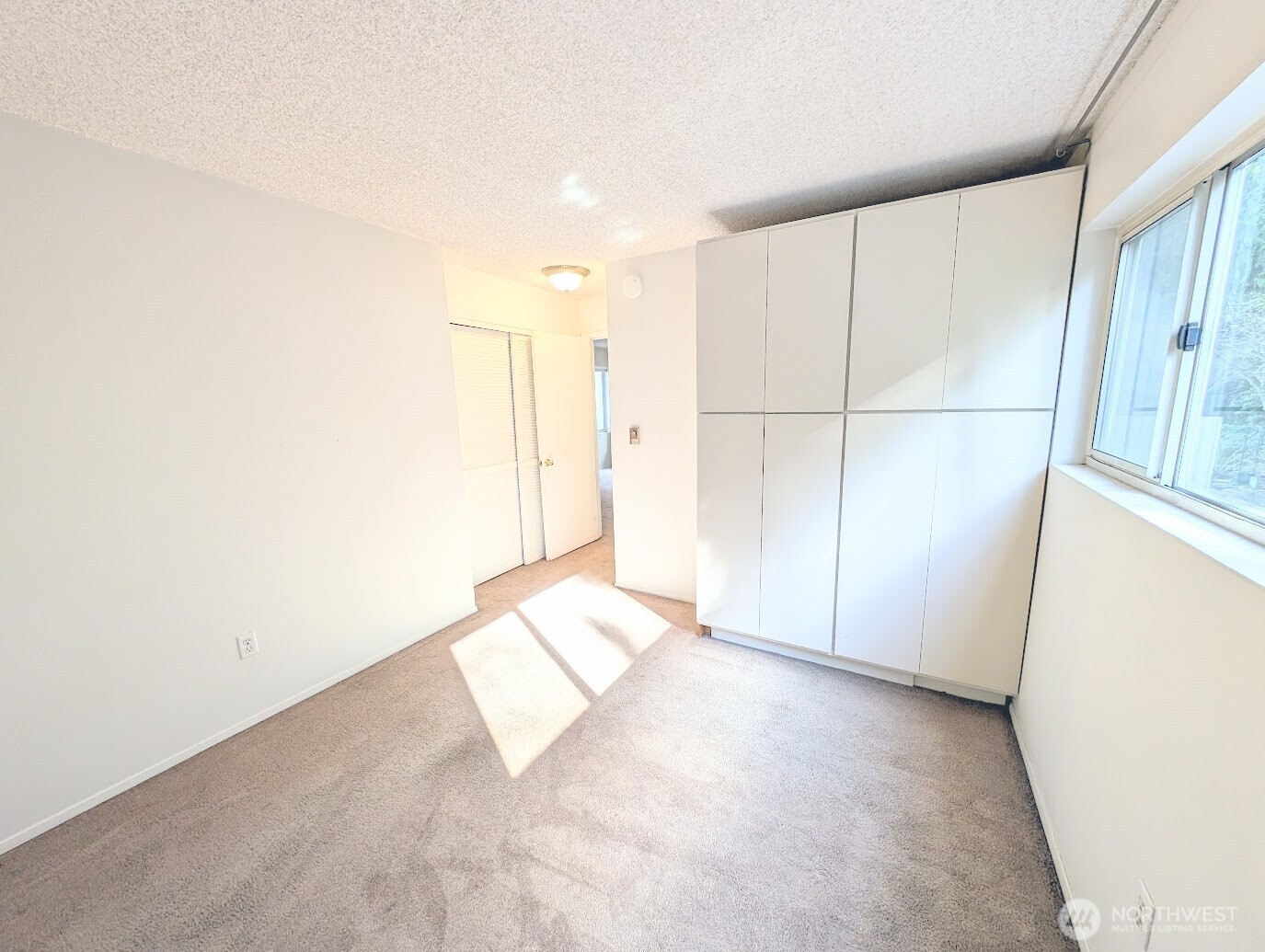 1156 Alki Avenue Southwest, Unit 201 Seattle, WA 98116 - Photo 20 of 40 a view of an empty room