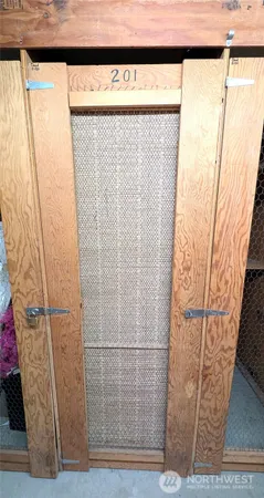 a view of a swimming pool with a table and chairs