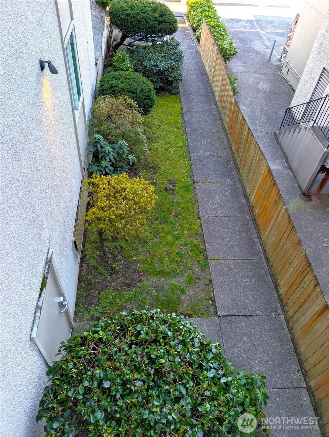 1156 Alki Avenue Southwest, Unit 201 Seattle, WA 98116 - Photo 25 of 40 a view of a garden