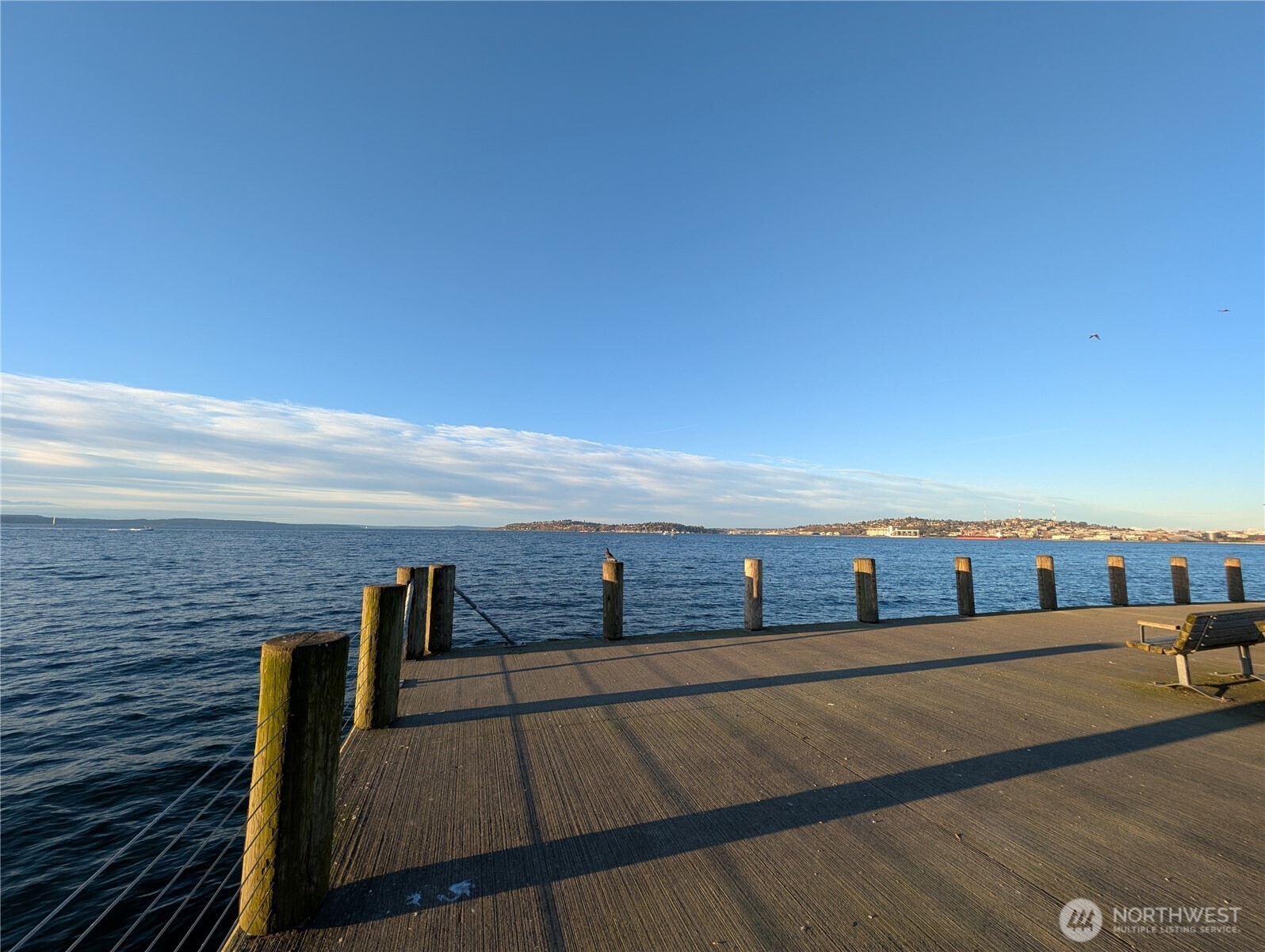 1156 Alki Avenue Southwest, Unit 201 Seattle, WA 98116 - Photo 29 of 40 a view of ocean from a balcony