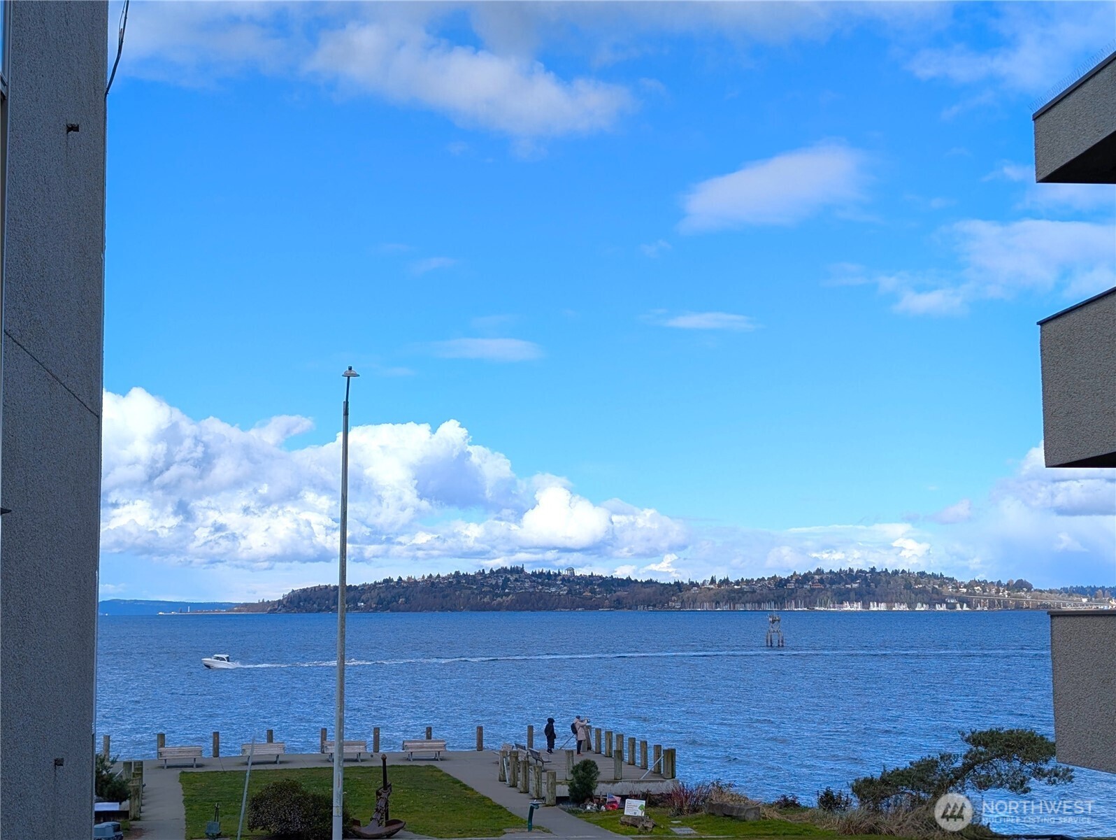 1156 Alki Avenue Southwest, Unit 201 Seattle, WA 98116 - Photo 39 of 40 a view of a city with ocean view