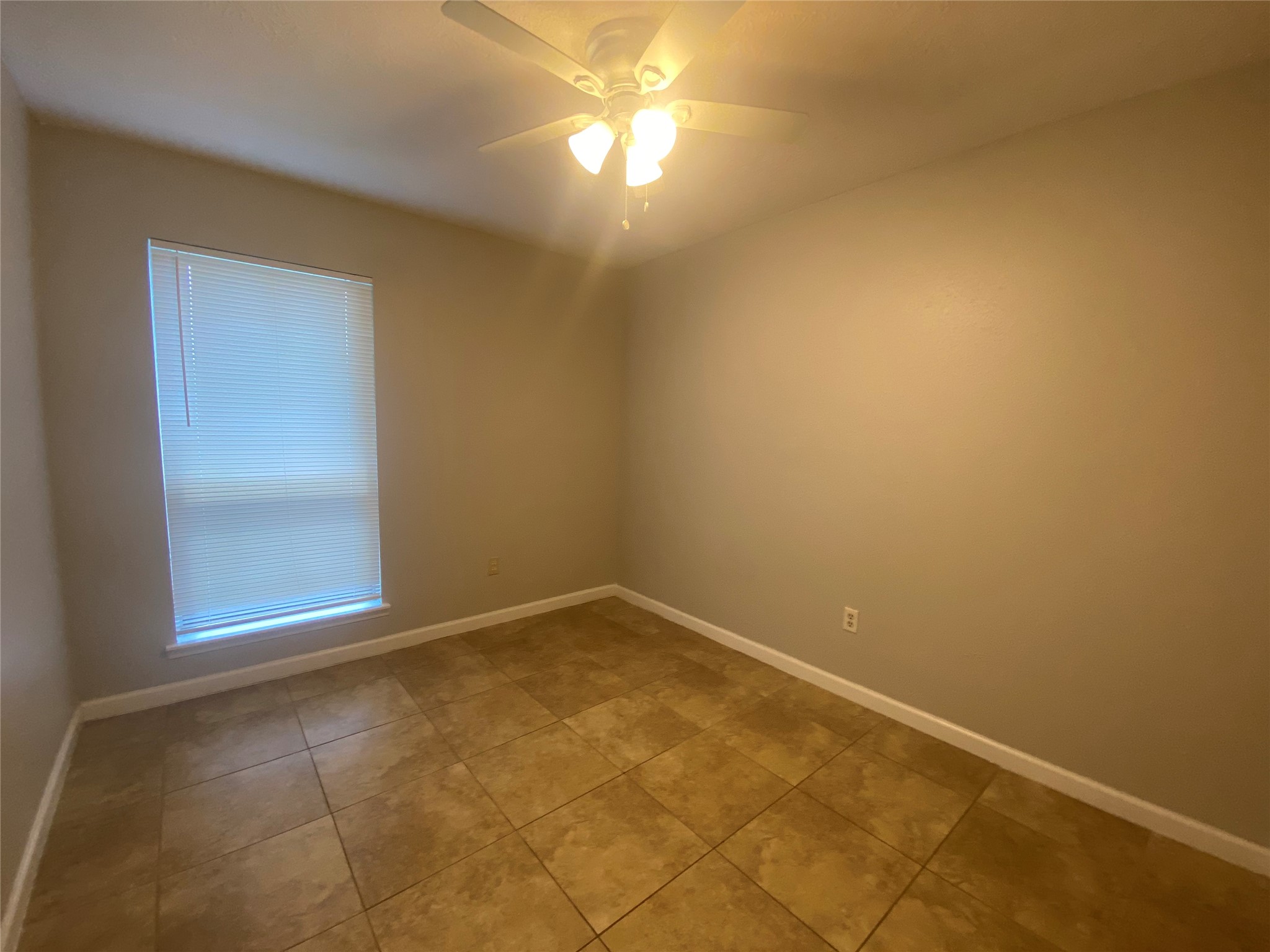 1330 Somercotes Lane Channelview, TX 77530 - Photo 13 of 13 an empty room with a empty space and a window
