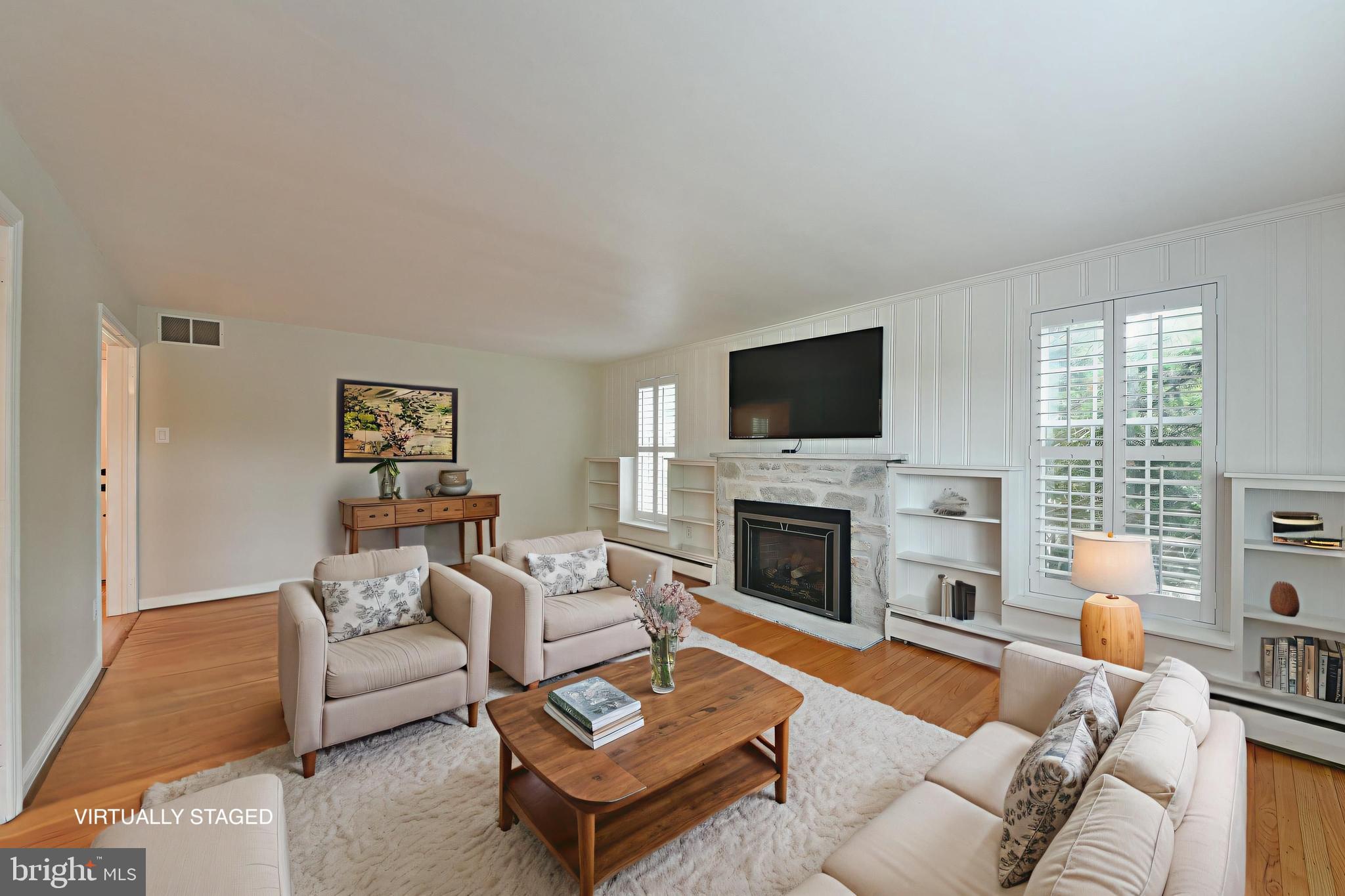 6113 West Mill Road Flourtown, PA 19031 - Photo 16 of 39 Living Room w Stone Fireplace & Built-Ins VSTAGED