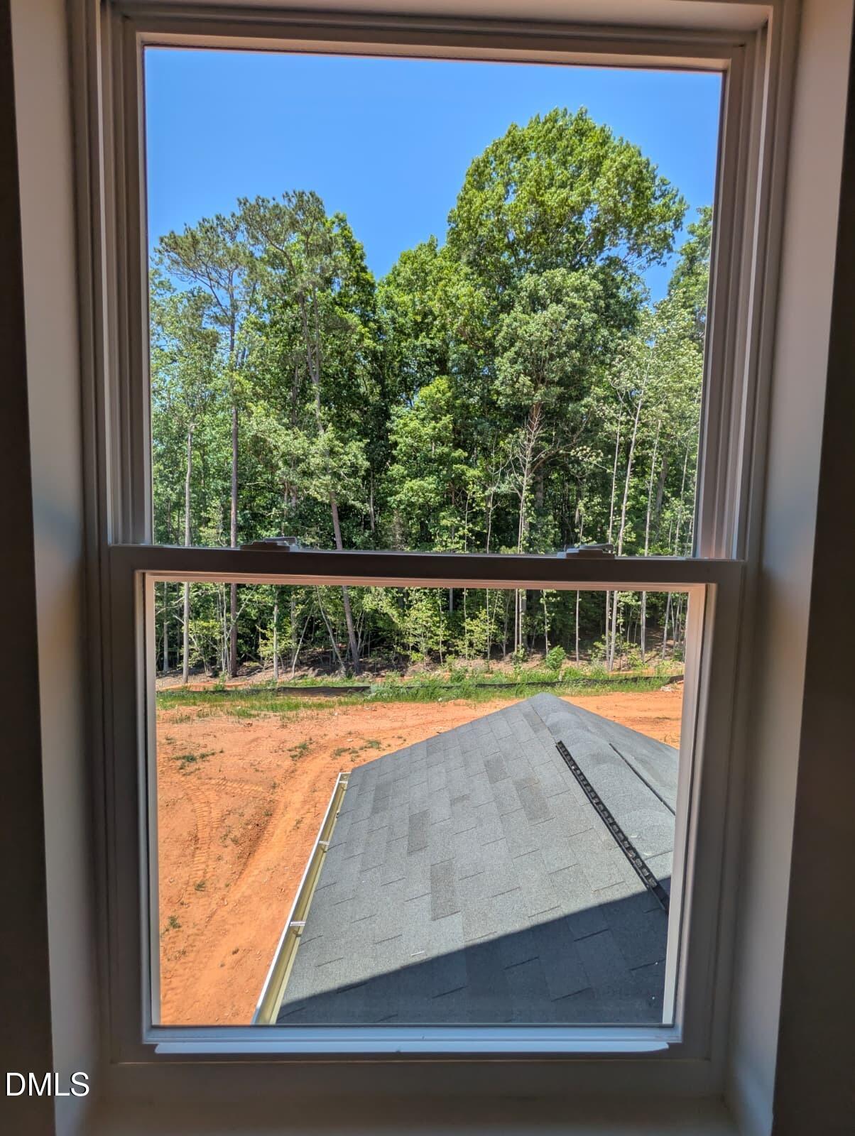 308 Karlov Road Garner, NC 27529 - Photo 26 of 55 a view of a small yard from a window