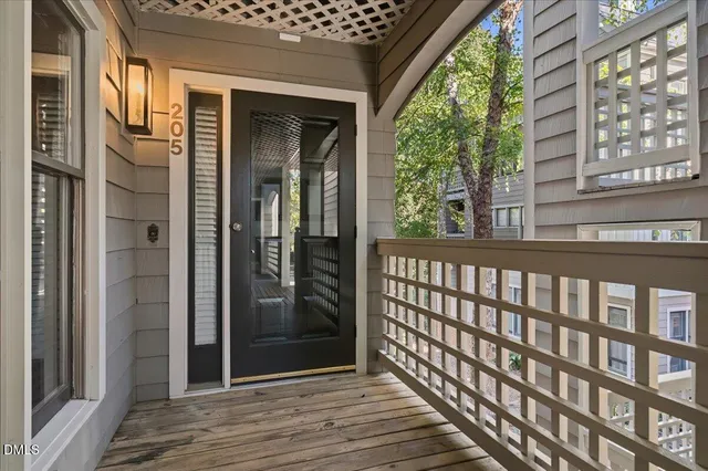 a view of a brick house with a large window