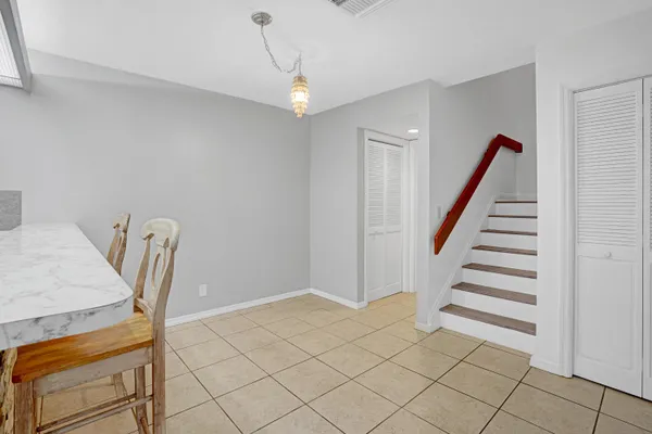a view of a dining room with furniture