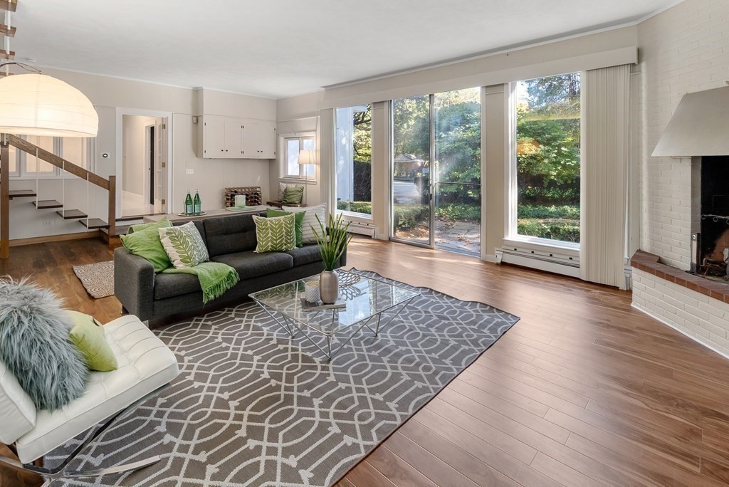 7 Turtle Lane Dover, MA 02030 - Photo 18 of 34 a living room with furniture and a fireplace