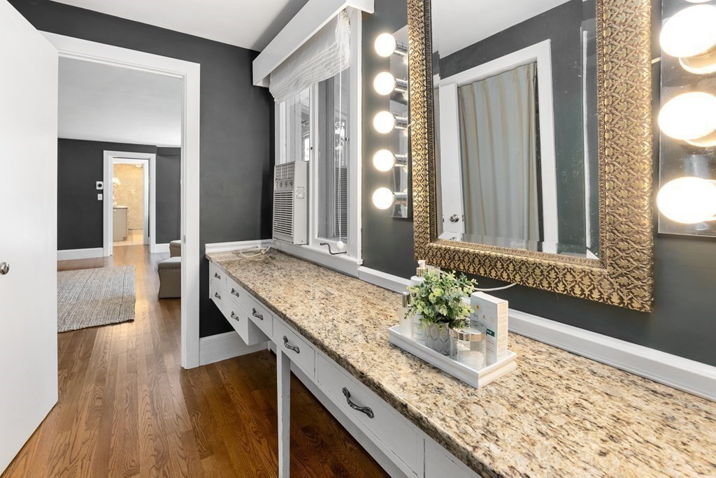 7 Turtle Lane Dover, MA 02030 - Photo 23 of 34 a bathroom with a granite countertop sink and a mirror