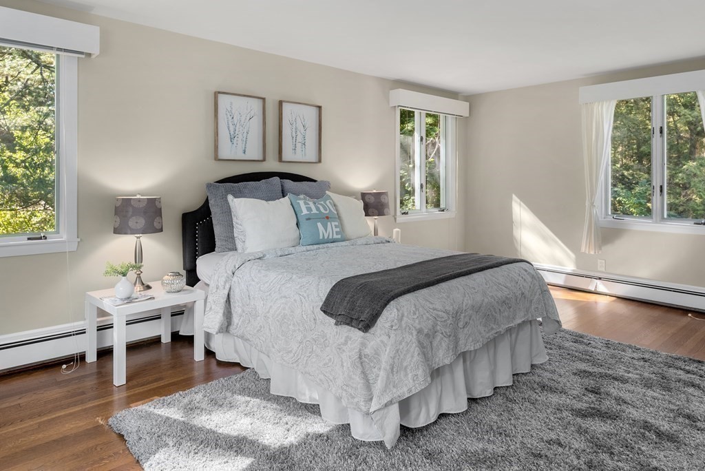 7 Turtle Lane Dover, MA 02030 - Photo 26 of 34 a bedroom with a bed and a window