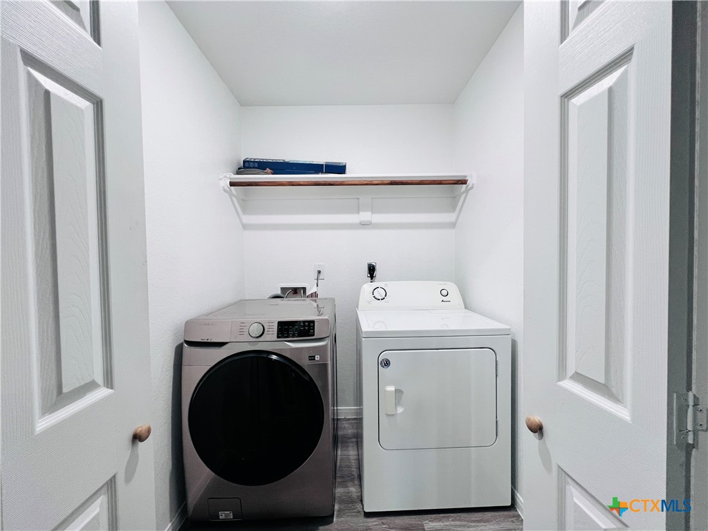 1403 Natchez Trail, Unit A Harker Heights, TX 76548 - Photo 6 of 14 a utility room with dryer and washer