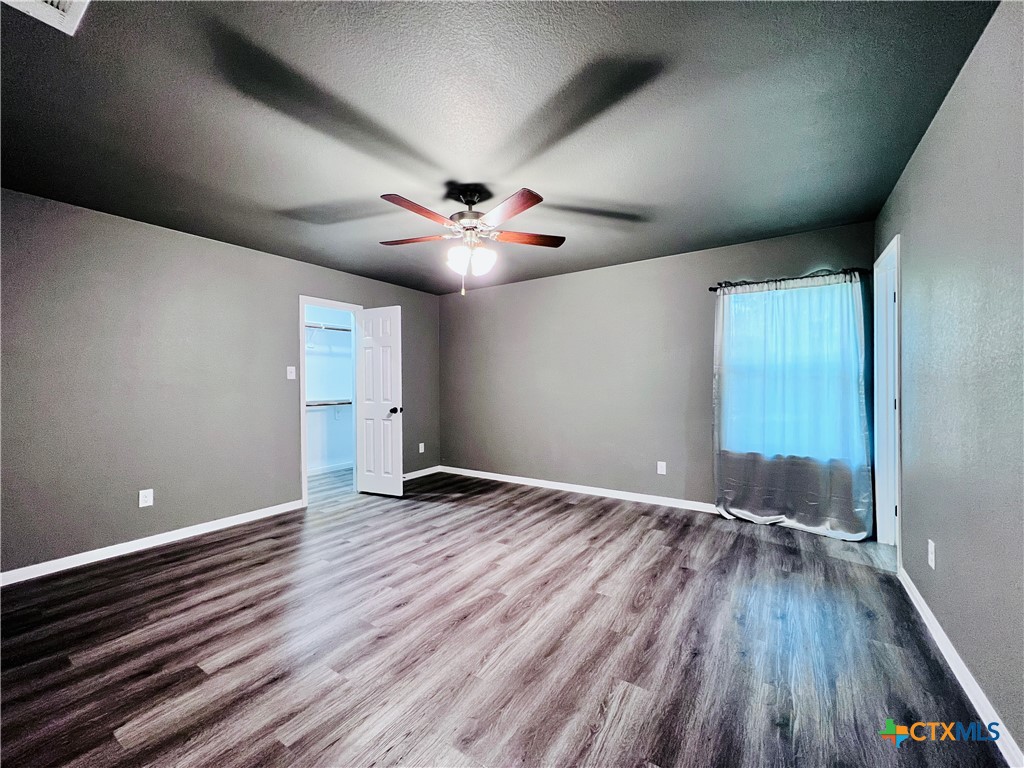1403 Natchez Trail, Unit A Harker Heights, TX 76548 - Photo 10 of 14 a view of an empty room with wooden floor