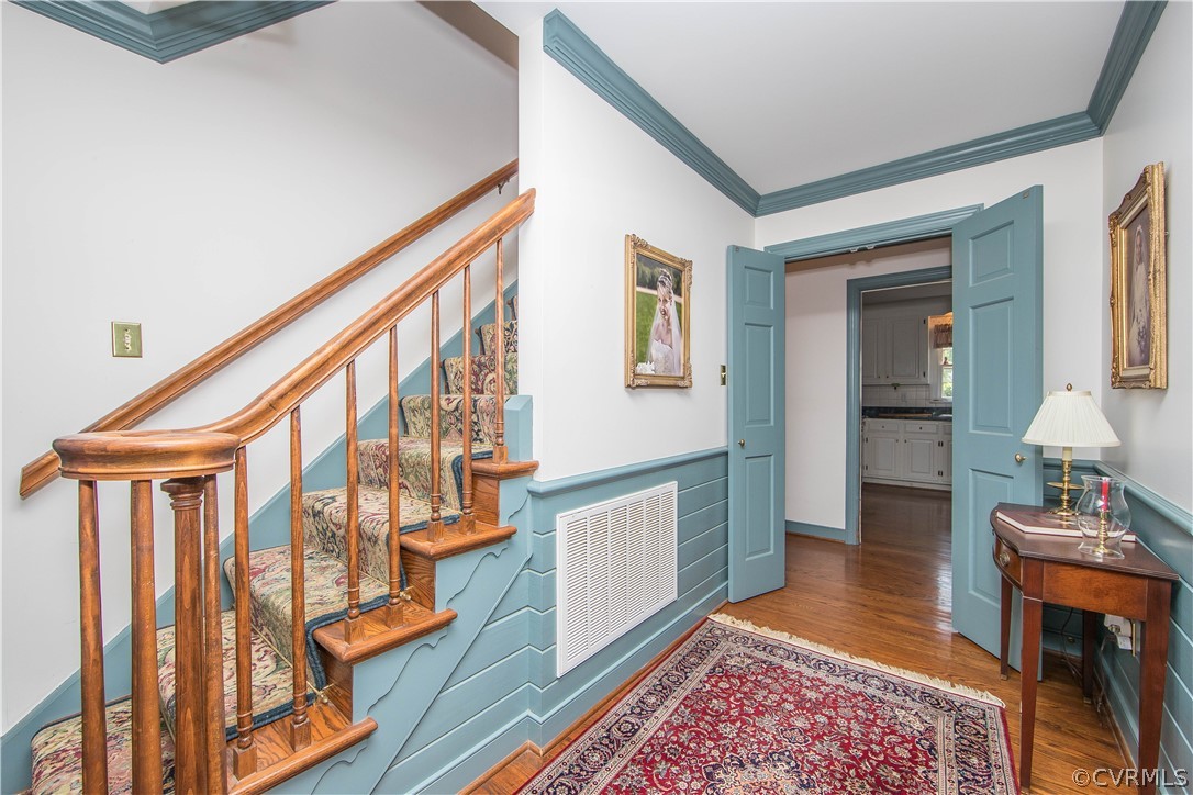 5731 Elfinwood Road Chester, VA 23831 - Photo 4 of 43 Foyer with wainscoting, chair rail, and 2 member c