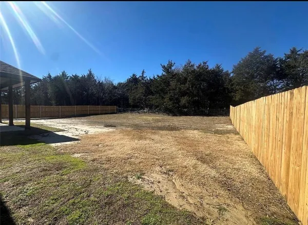 a view of a swimming pool with an outdoor space
