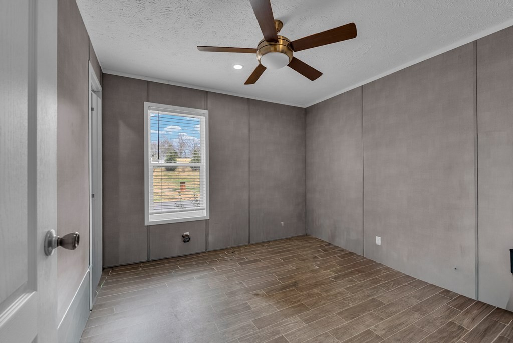 1083 Fanchers Mill Road Sparta, TN 38583 - Photo 24 of 67 a view of an empty room with a window