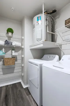 a view of storage and utility room with washer and dryer