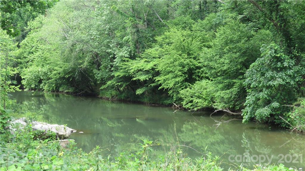 764 Lattimore Road Rutherfordton, NC 28139 - Photo 4 of 29 a view of a lake with a yard