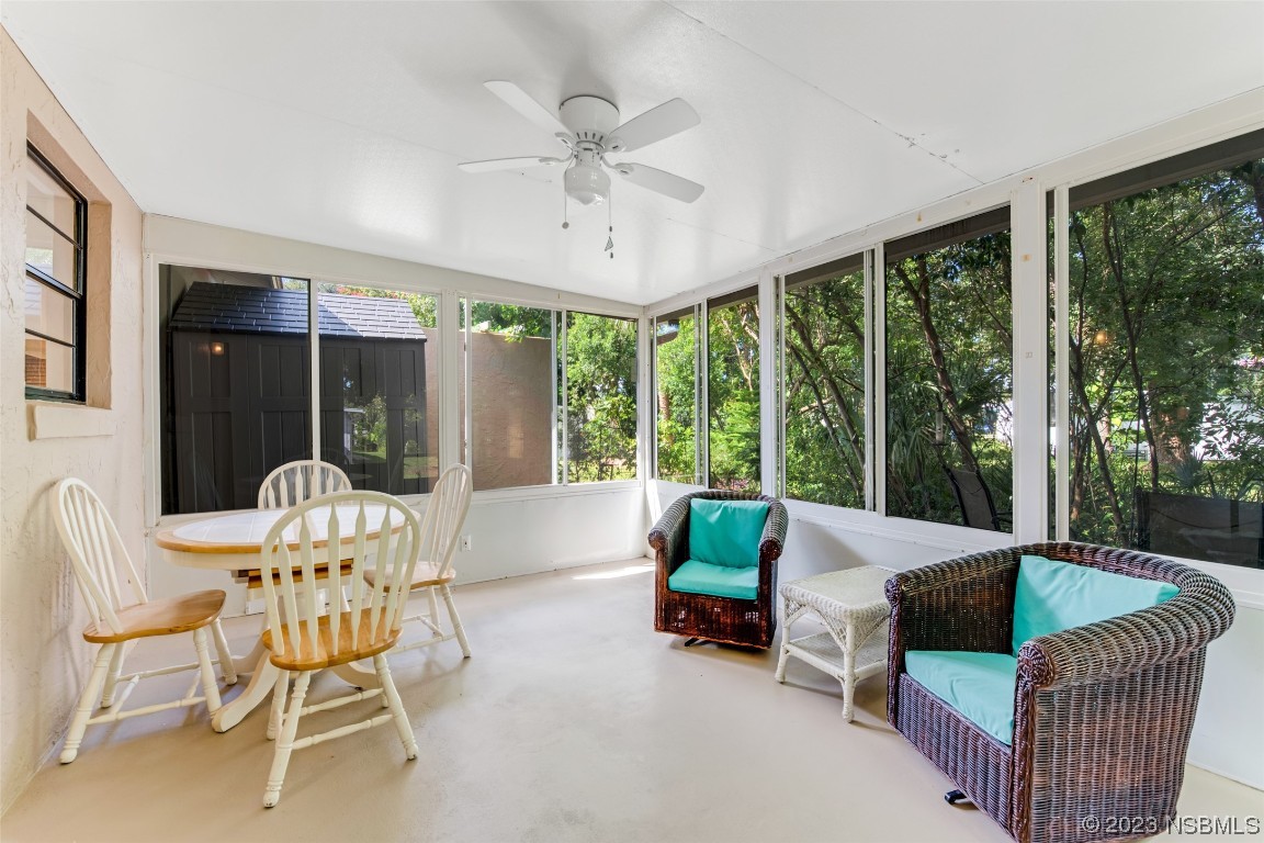 17 Pelican Drive Edgewater, FL 32141 - Photo 20 of 32 a living room with furniture and a large window