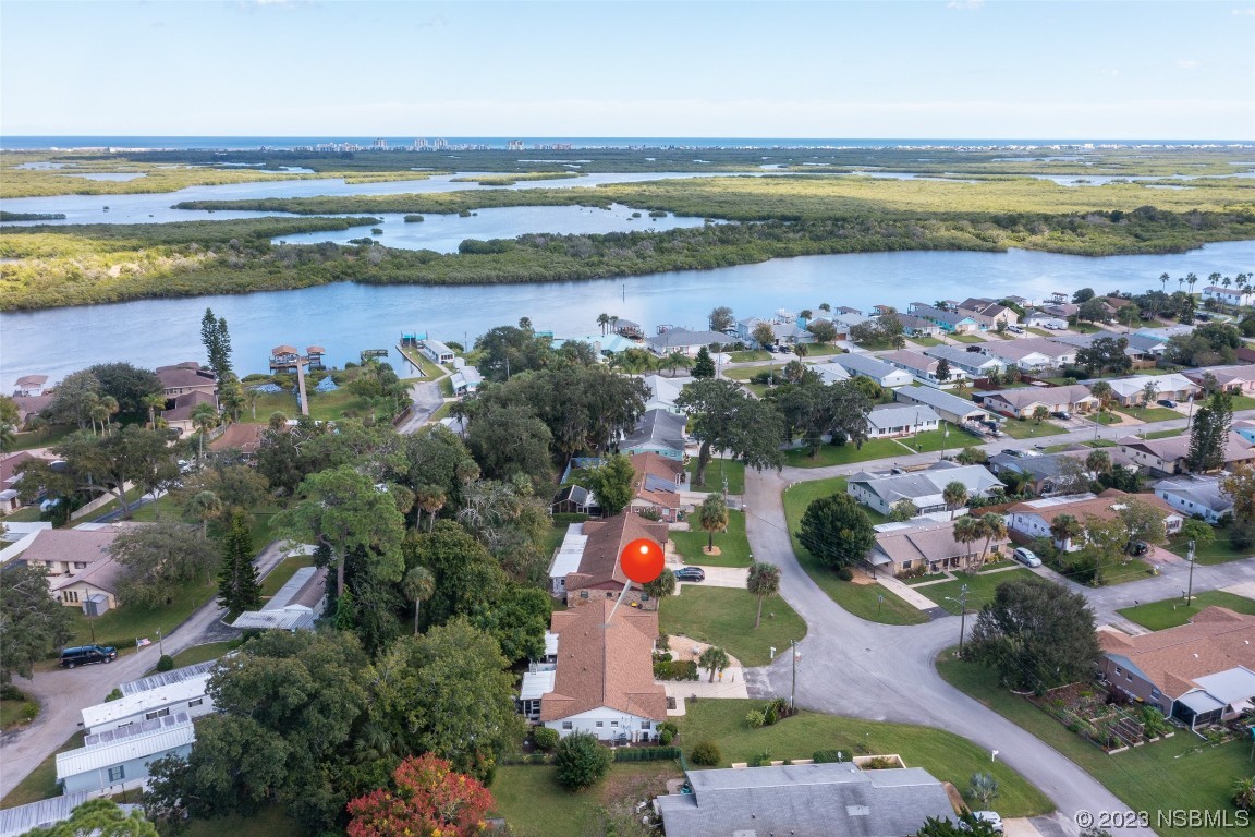 17 Pelican Drive Edgewater, FL 32141 - Photo 2 of 32 a view of a city and lake view