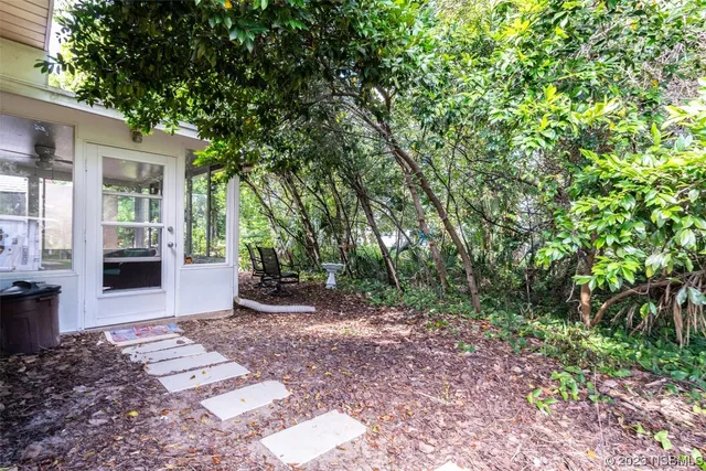 a view of a backyard with garden