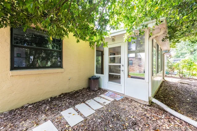 a house view with a backyard space