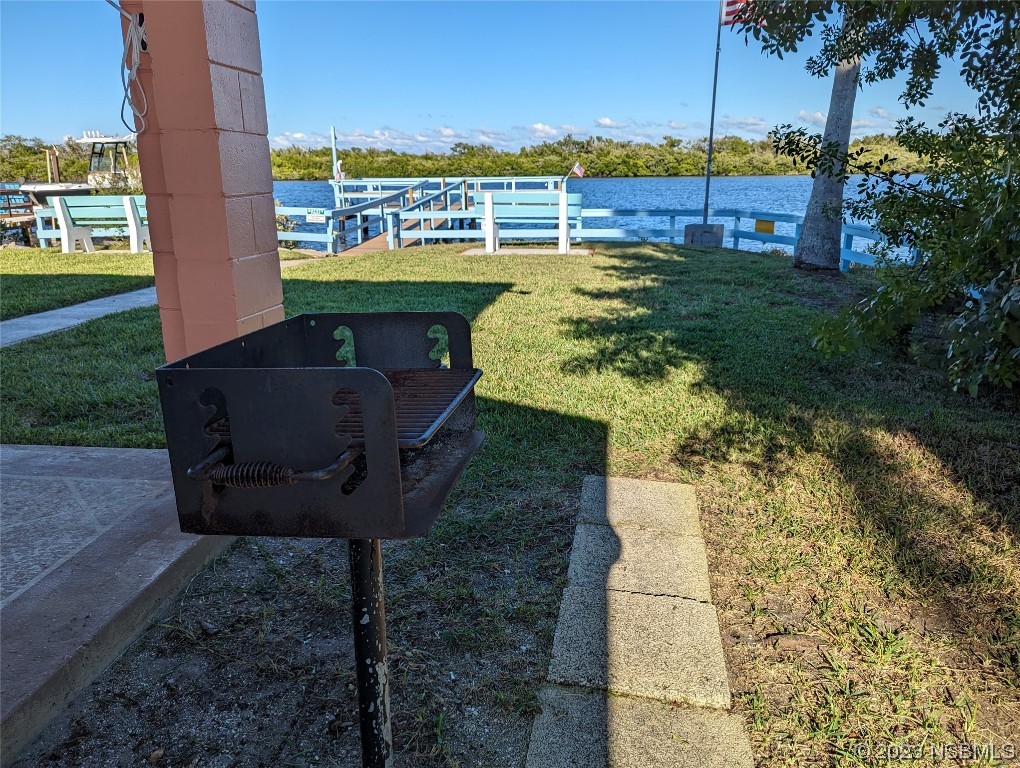 17 Pelican Drive Edgewater, FL 32141 - Photo 25 of 32 a view of a garden with an outdoor space