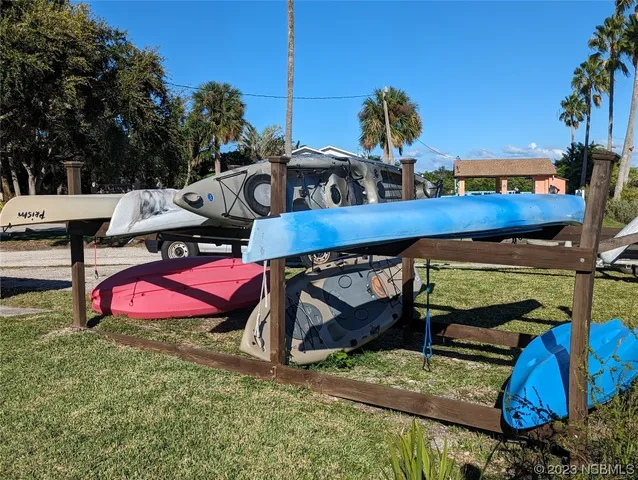 a view of a garden with sitting area