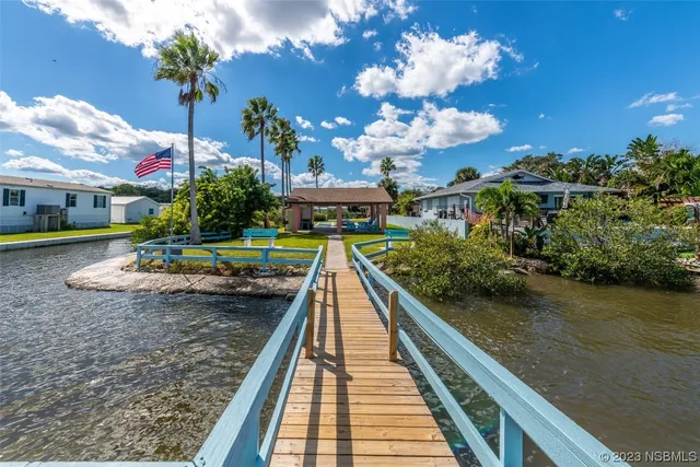 a view of an ocean and a city