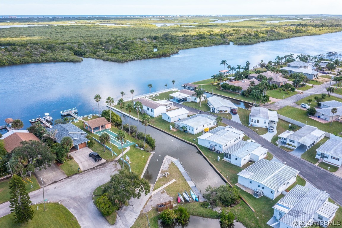 17 Pelican Drive Edgewater, FL 32141 - Photo 32 of 32 an aerial view of a city with lake view