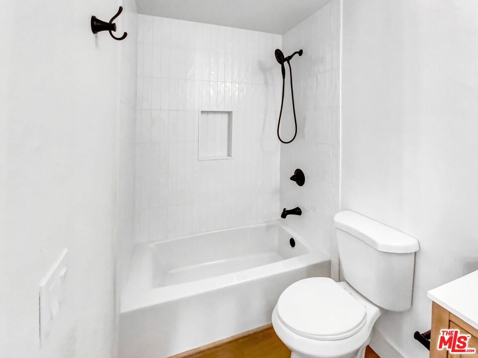 830 Vía Alameda San Dimas, CA 91773 - Photo 25 of 31 a bathroom with a shower a toilet and a shower