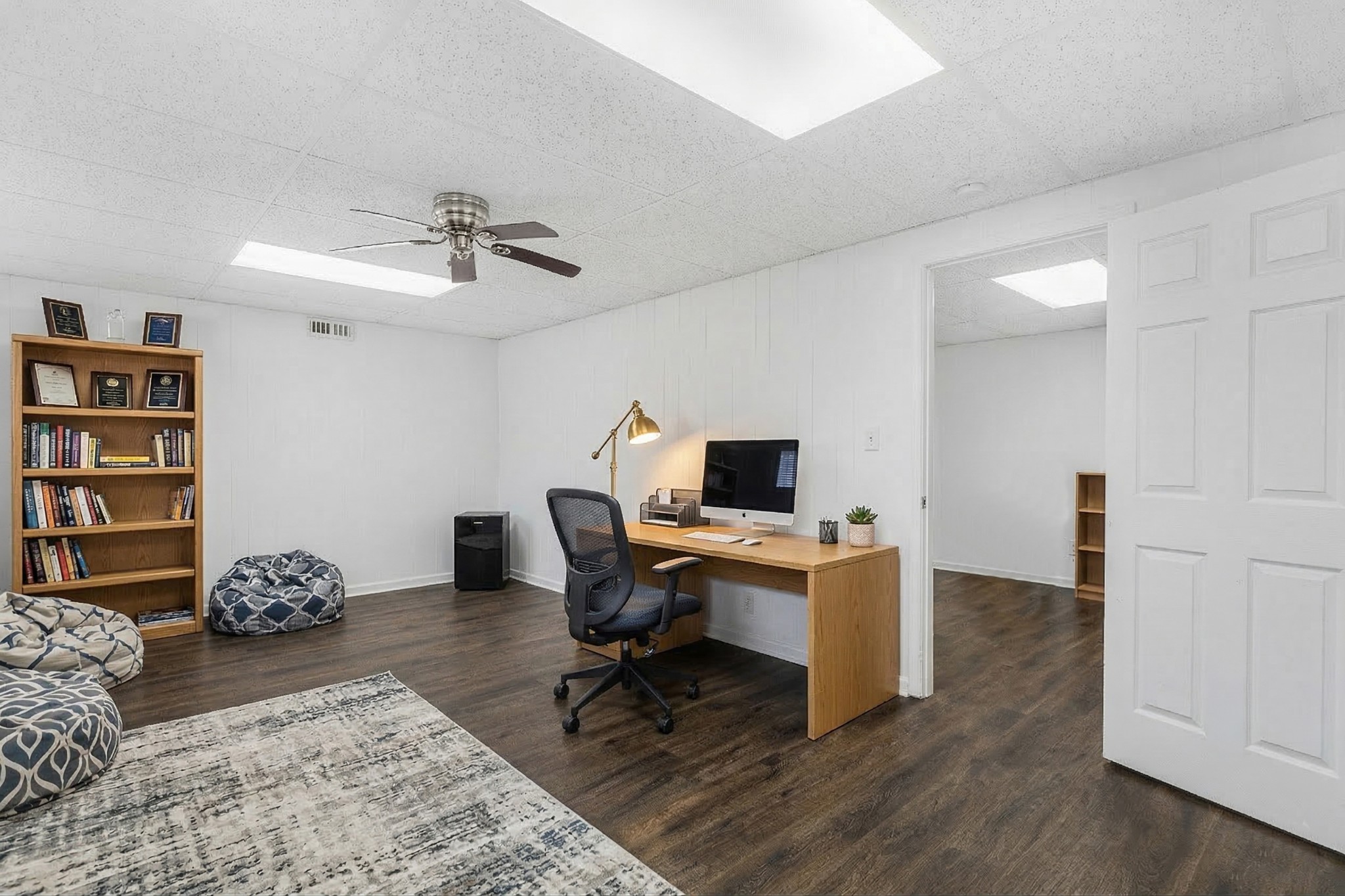 6035 Buzzard Creek Road Cedar Hill, TN 37032 - Photo 30 of 42 a view of a workspace with furniture and wooden floor