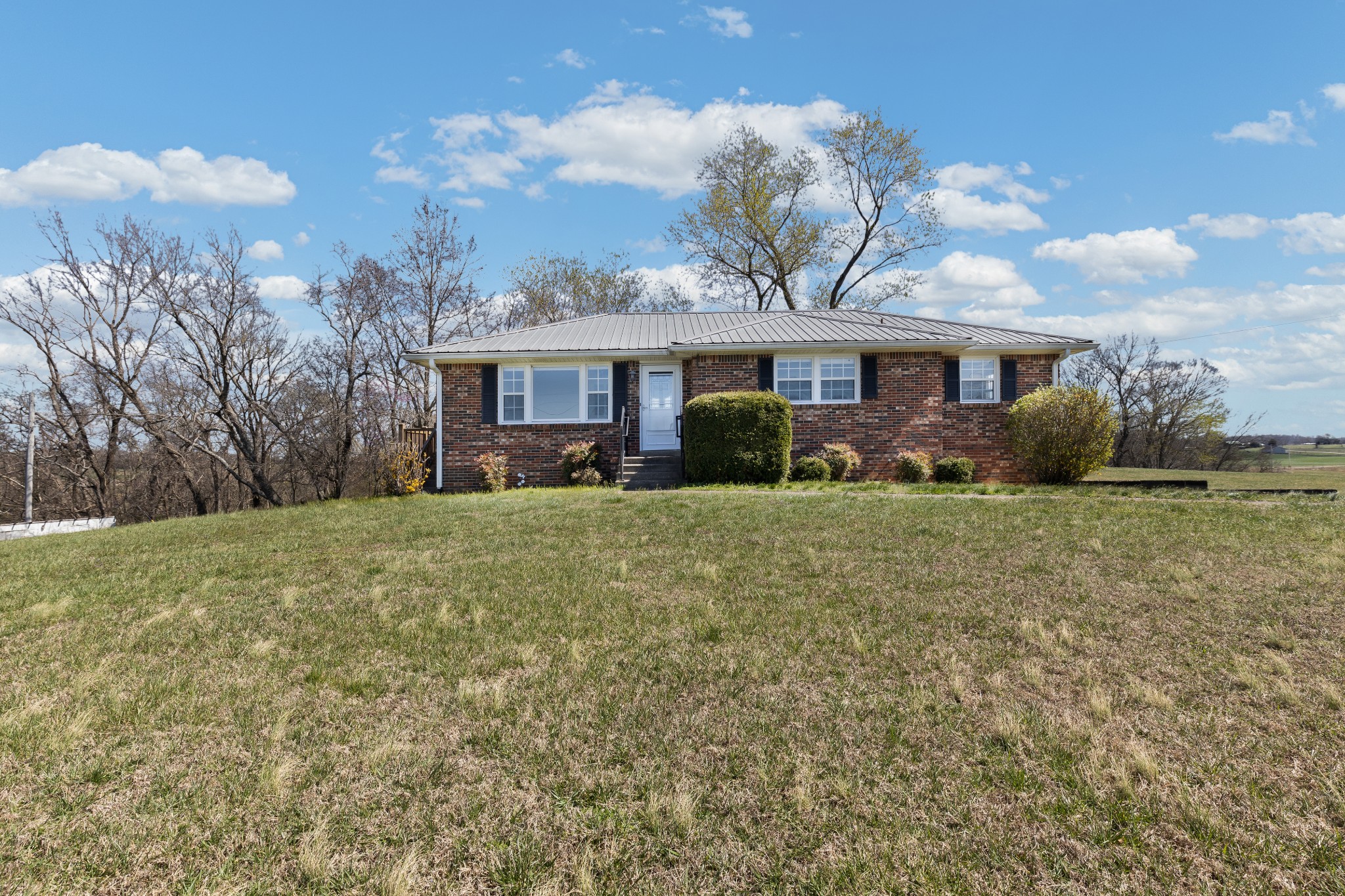 6035 Buzzard Creek Road Cedar Hill, TN 37032 - Photo 42 of 42 a front view of house with yard