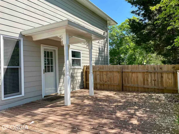 a view of a backyard of the house