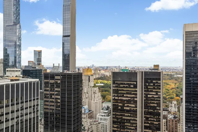 a view of a city with tall buildings