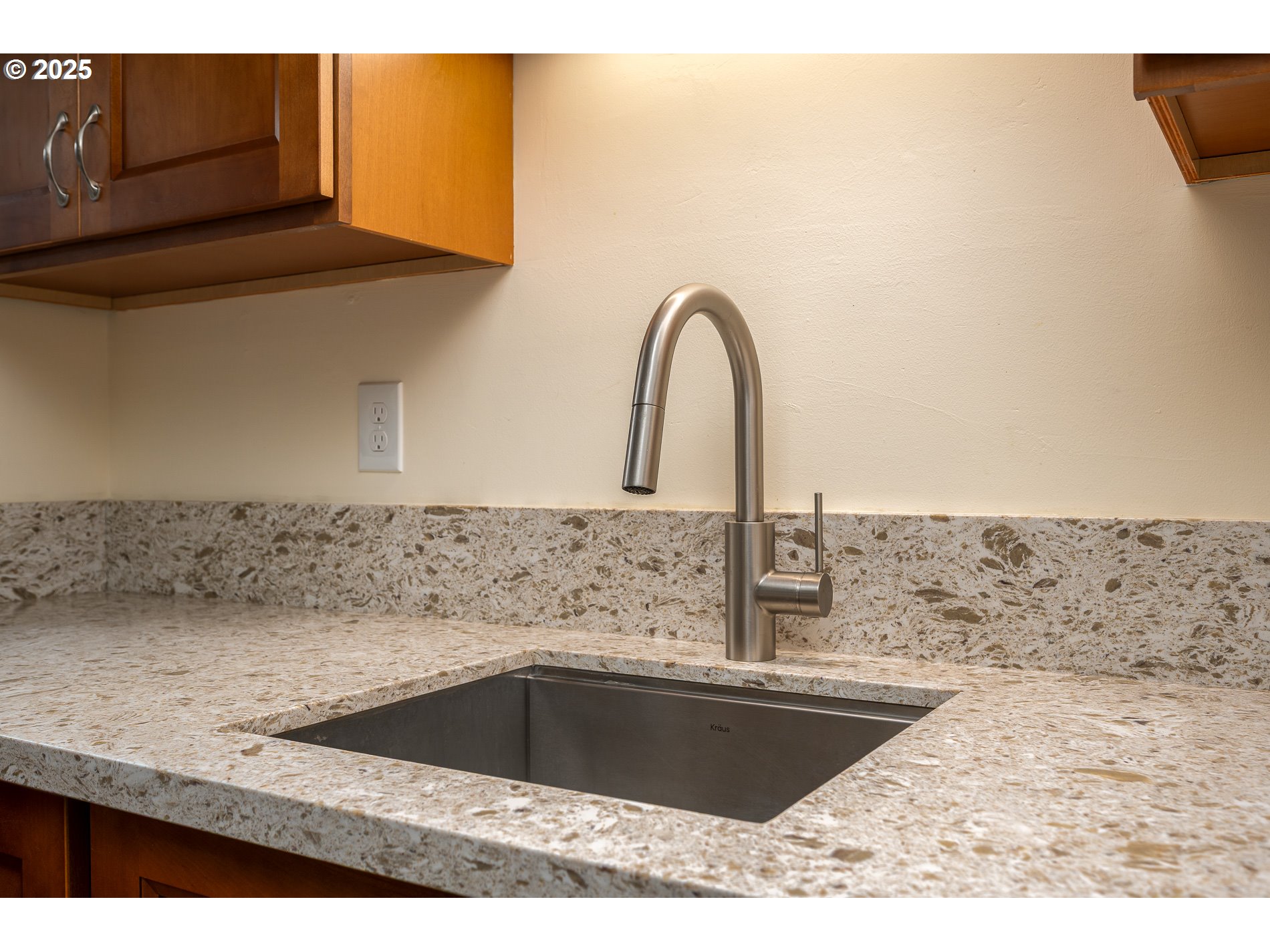 13020 Northeast San Rafael Street Portland, OR 97230 - Photo 12 of 35 a kitchen with granite countertop a sink and a stove
