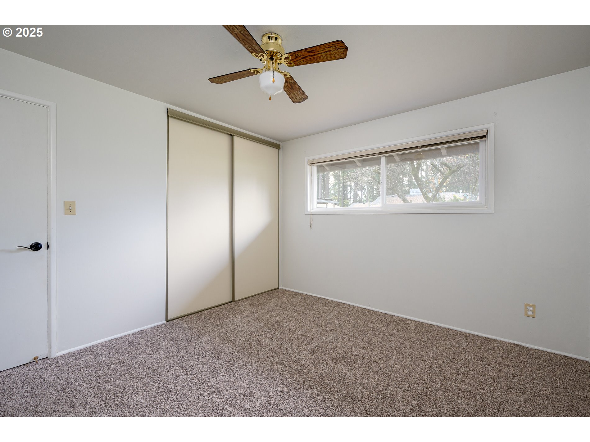 13020 Northeast San Rafael Street Portland, OR 97230 - Photo 24 of 35 a view of an empty room with a window
