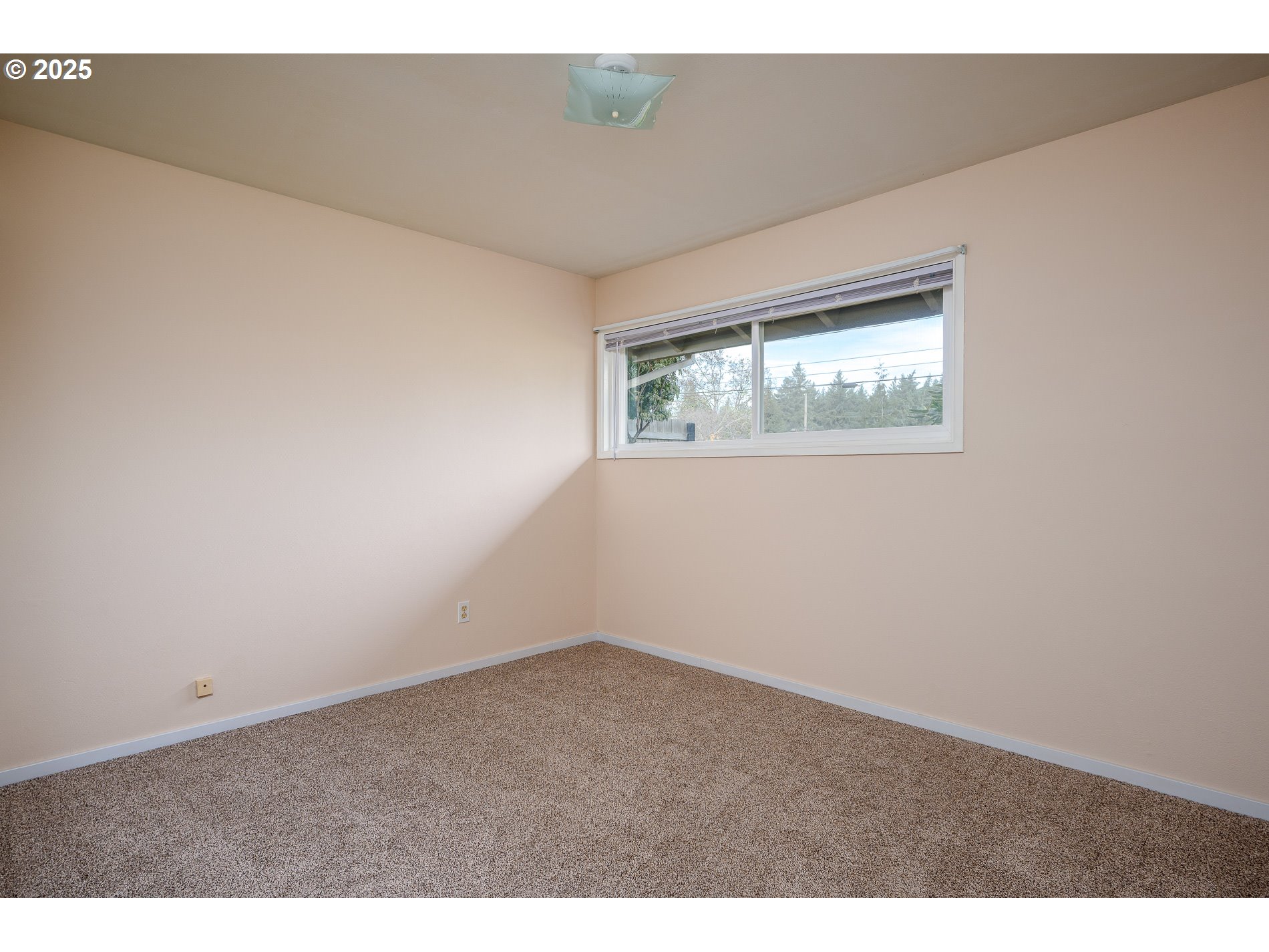 13020 Northeast San Rafael Street Portland, OR 97230 - Photo 27 of 35 a view of an empty room and window