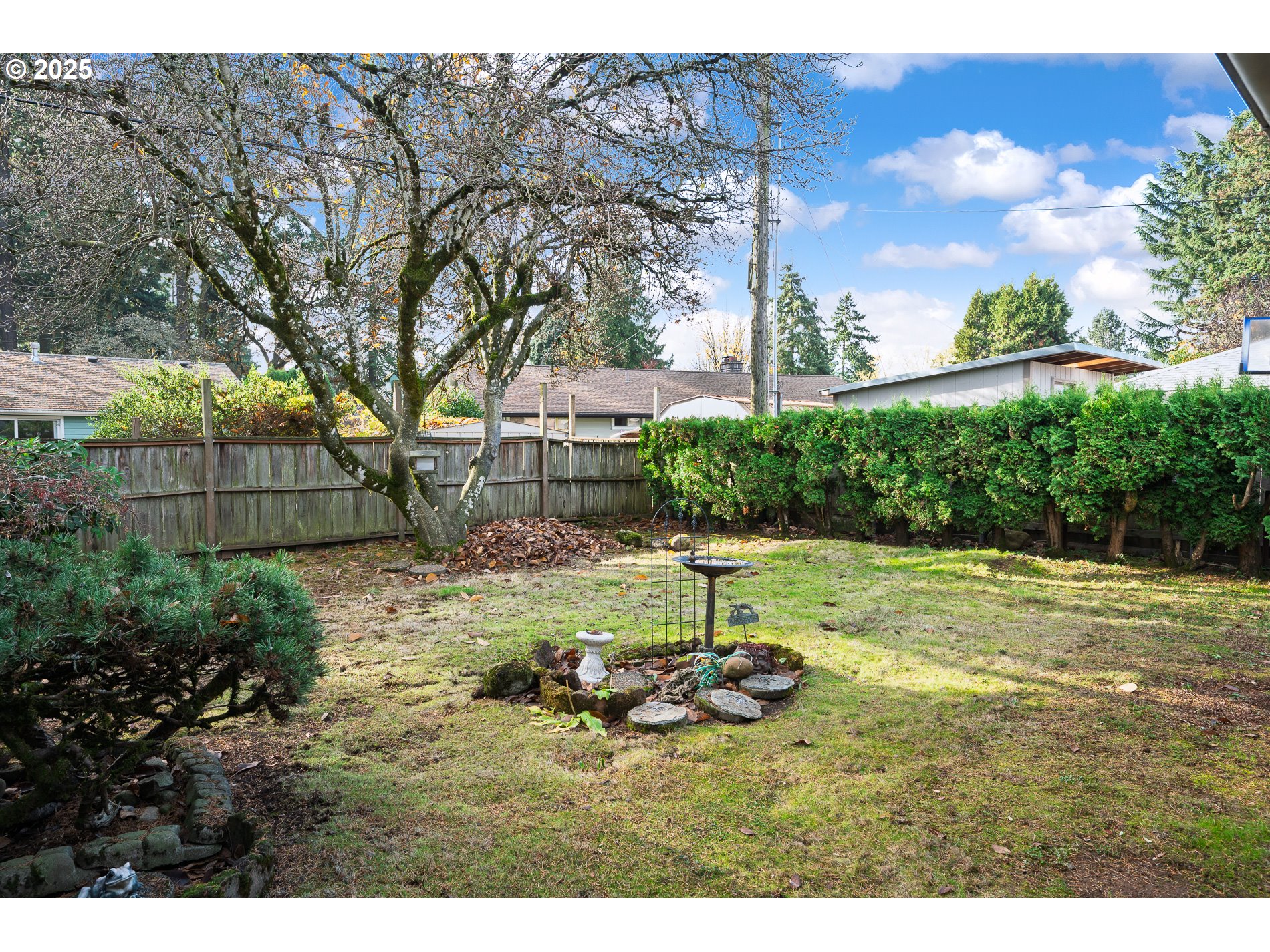 13020 Northeast San Rafael Street Portland, OR 97230 - Photo 31 of 35 a view of a backyard with a garden