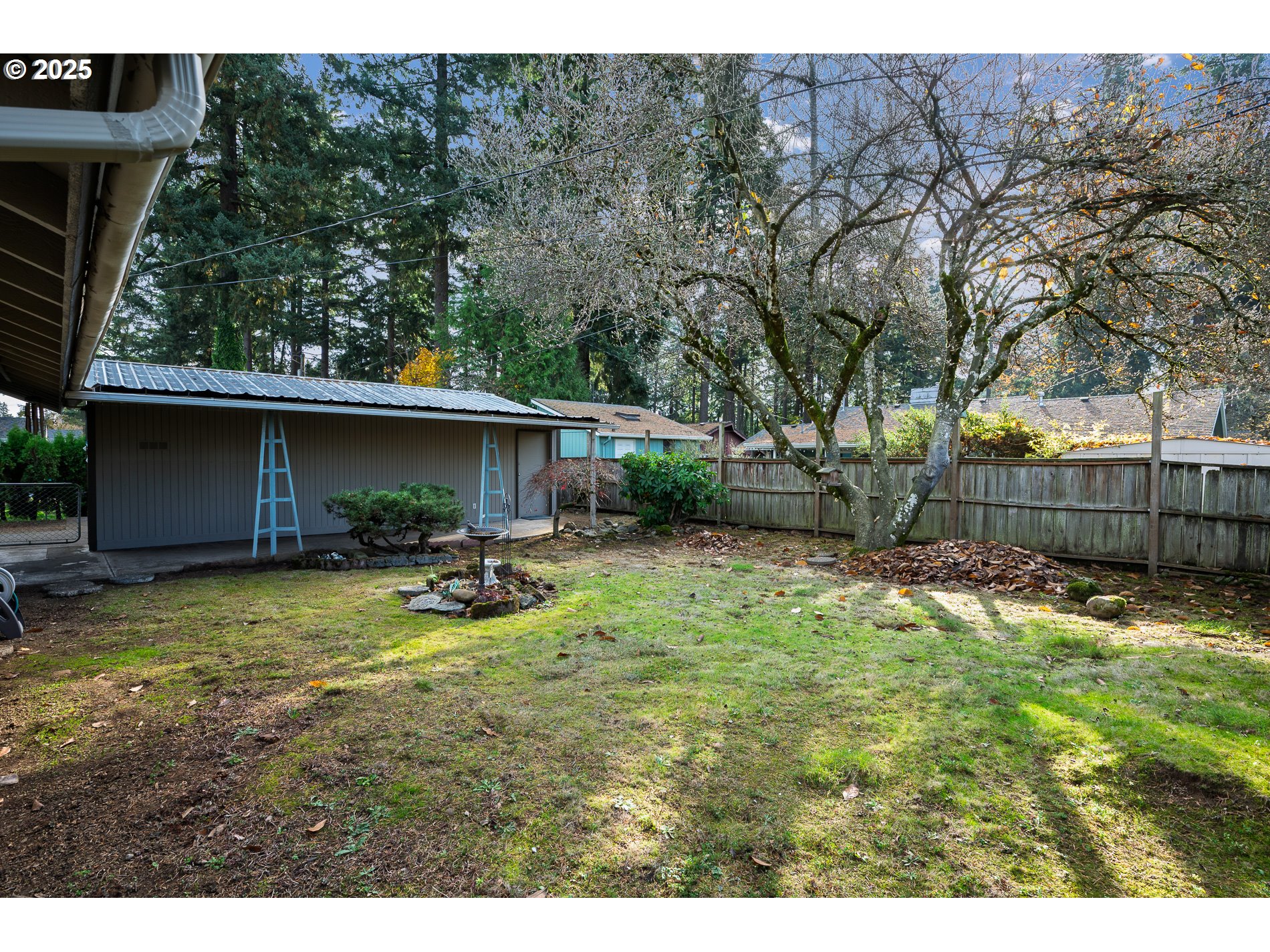 13020 Northeast San Rafael Street Portland, OR 97230 - Photo 32 of 35 a view of backyard with wooden fence and a slide