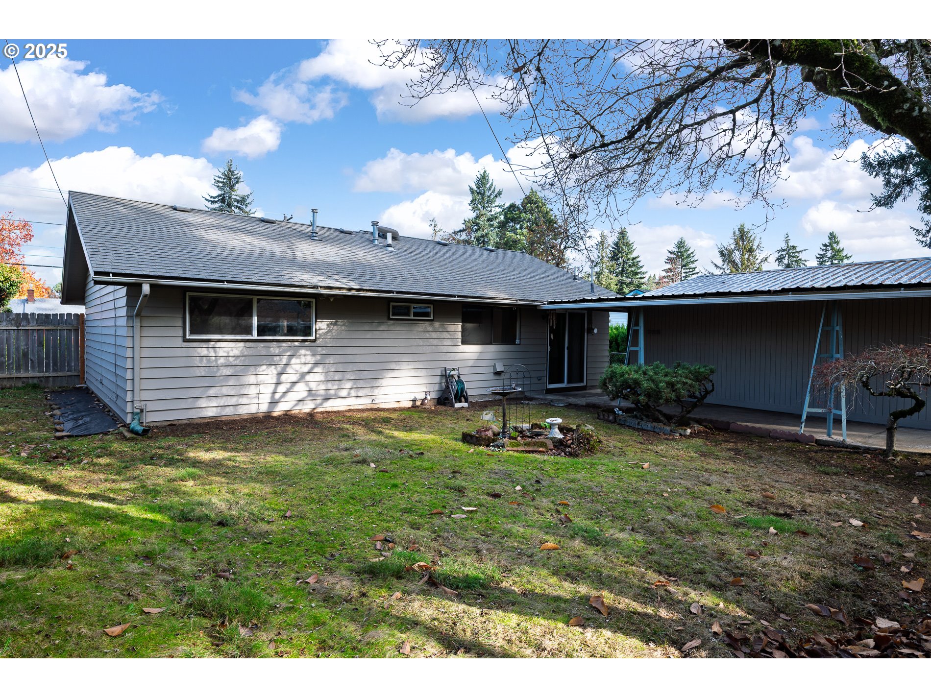 13020 Northeast San Rafael Street Portland, OR 97230 - Photo 34 of 35 a view of a house with a yard balcony and sitting area