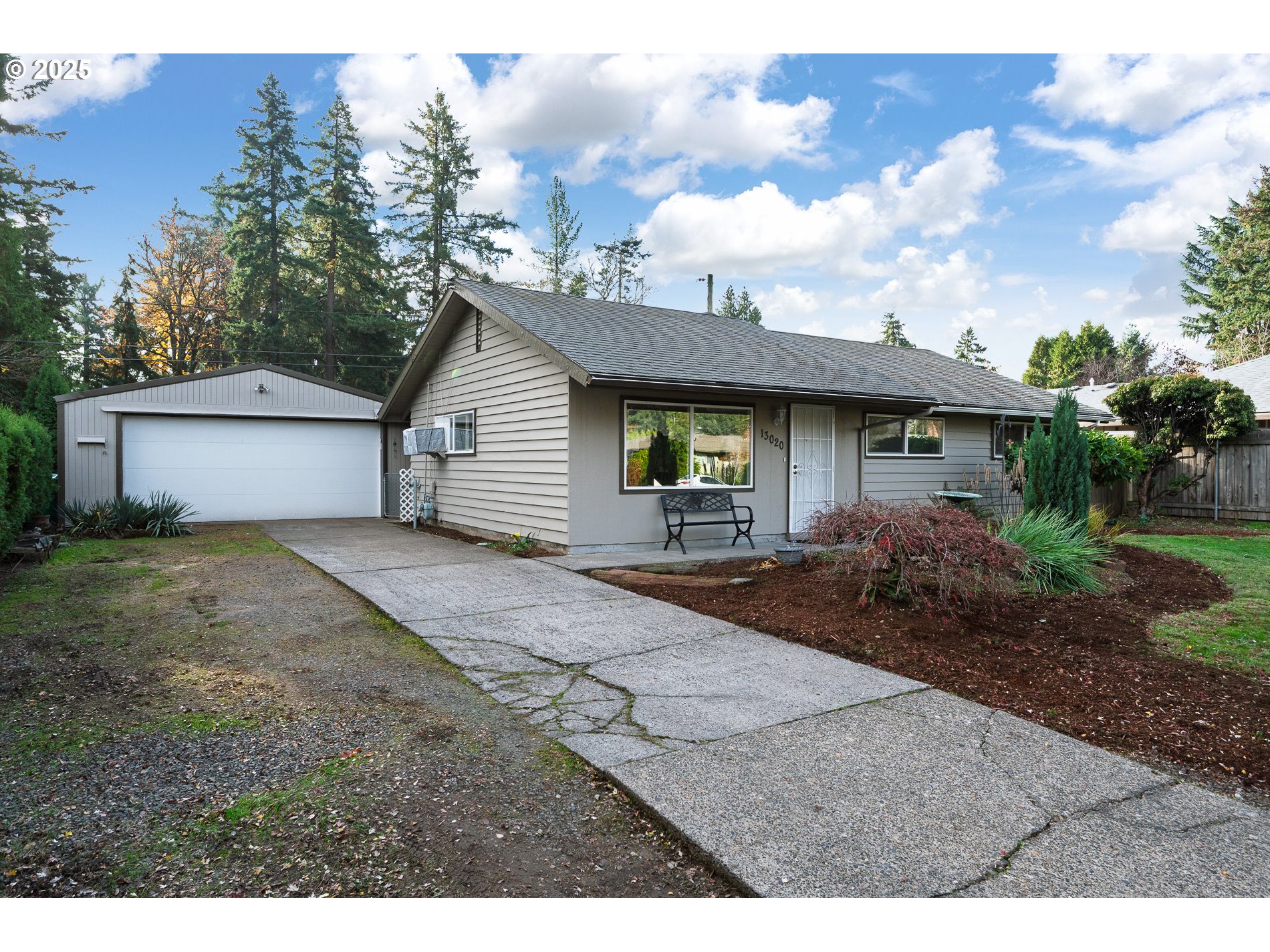13020 Northeast San Rafael Street Portland, OR 97230 - Photo 5 of 35 a front view of a house with garden