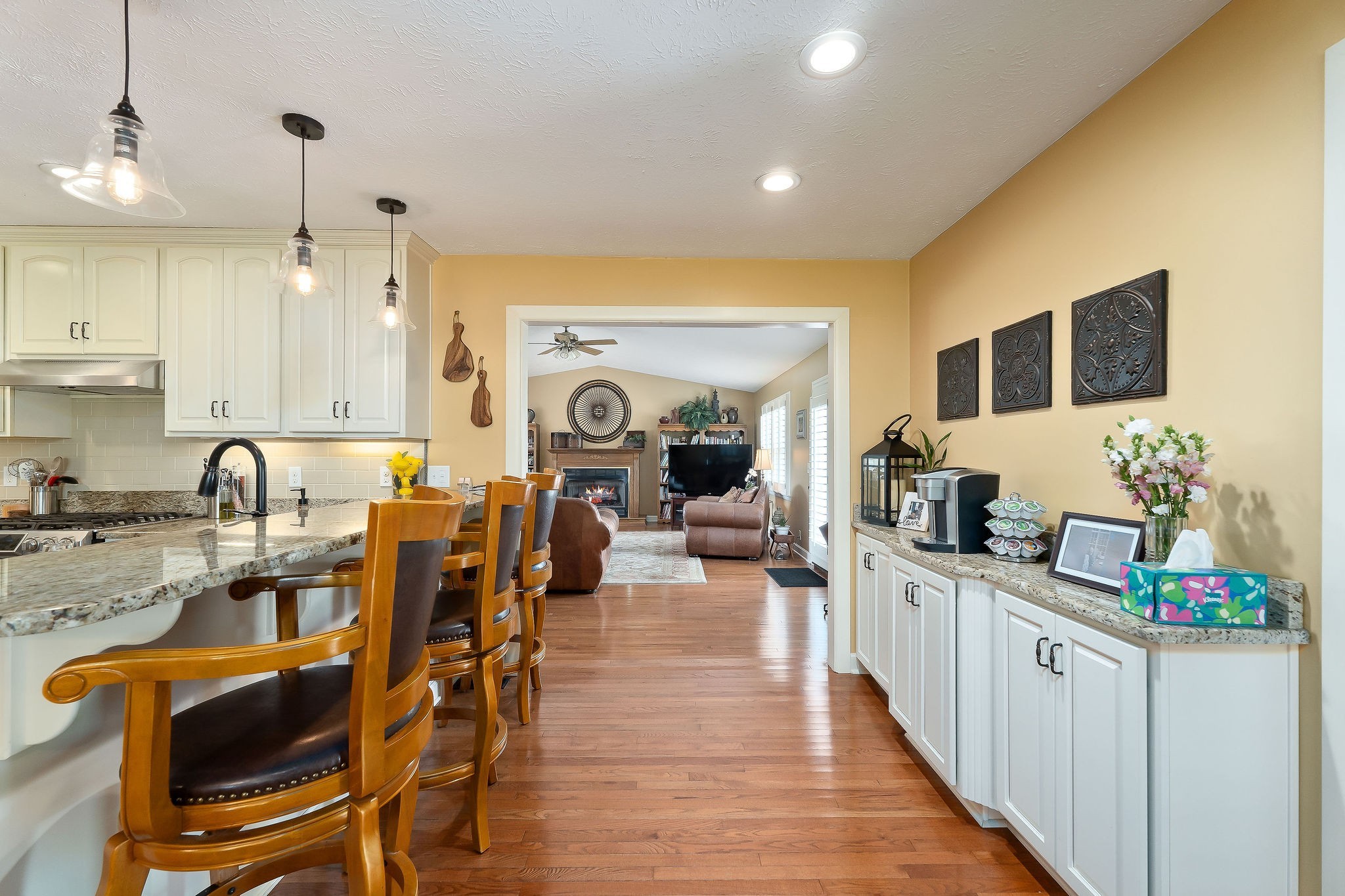 1051 Herman Lance Road Morrison, TN 37357 - Photo 11 of 57 a large kitchen with stainless steel appliances kitchen island granite countertop a sink and cabinets