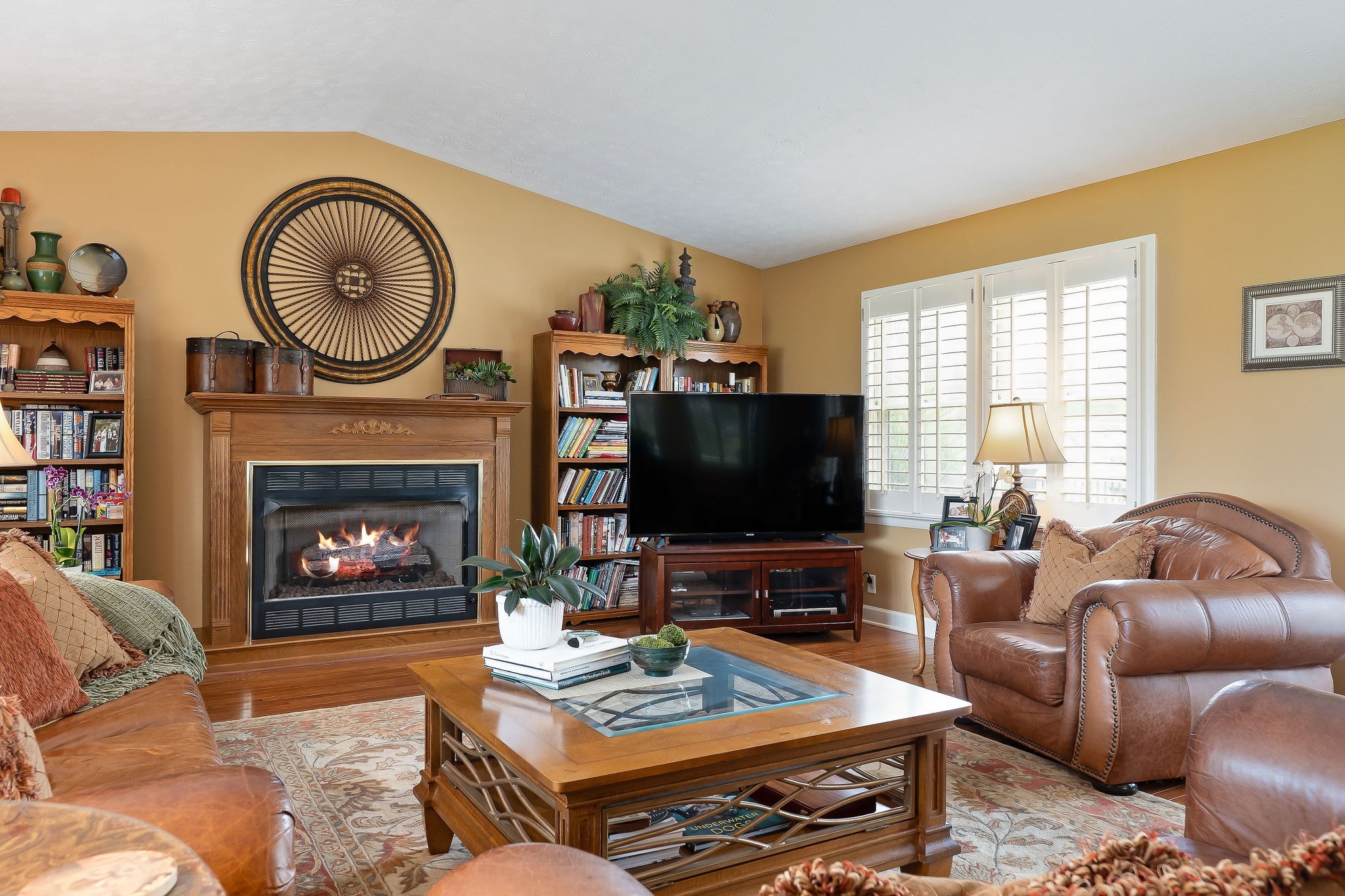 1051 Herman Lance Road Morrison, TN 37357 - Photo 13 of 57 a living room with furniture a flat screen tv and a fireplace